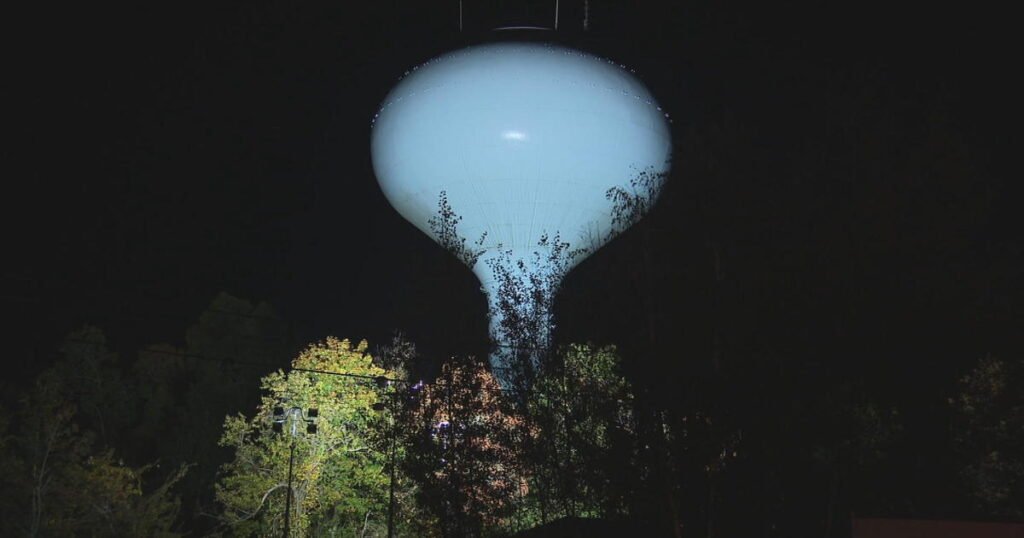 Political messages illegally projected onto water tower in Massachusetts